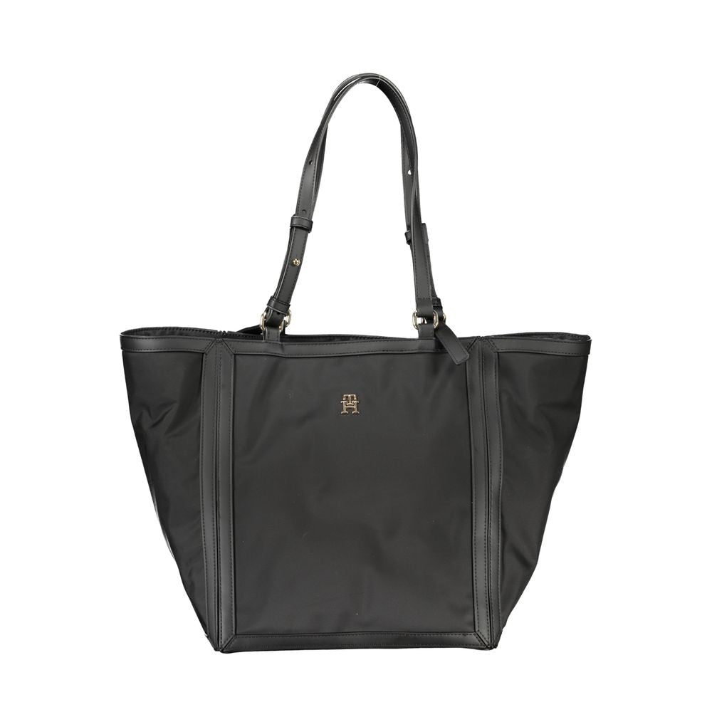 Sac à main pour femme Tommy Hilfiger en polyester noir, élégant et pratique, avec détails de la marque visible.