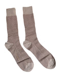 Chaussettes pour hommes Dolce & Gabbana, marron solide avec logo DG, mi-mollet, style élégant et confortable.