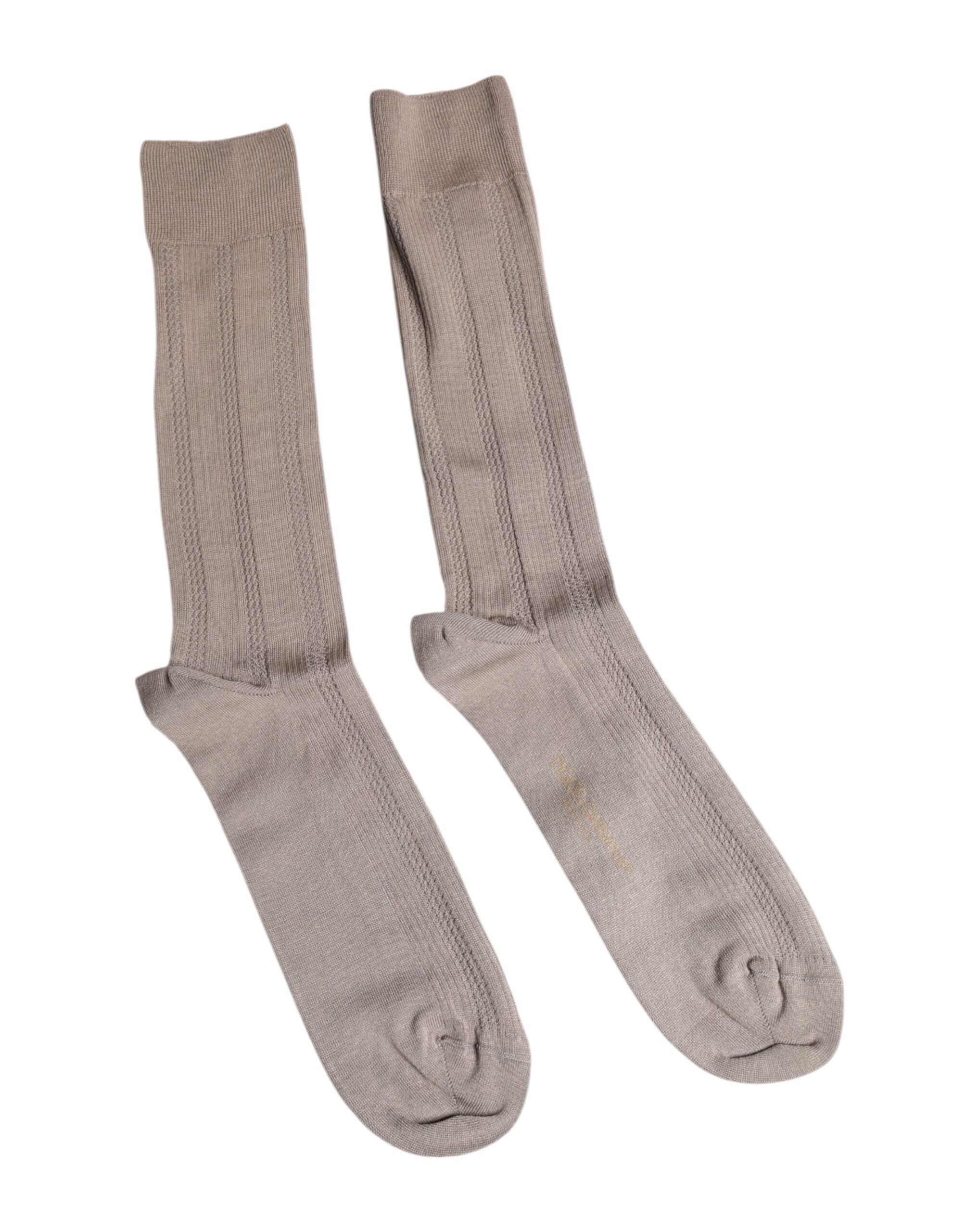 Chaussettes en coton marron Dolce & Gabbana, logo visible, montées sur le mollet, extensibles et confortables.