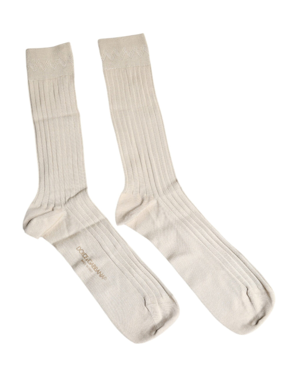 Chaussettes mi-mollet en coton stretch beige avec logo Dolce & Gabbana, confort et style élégants.