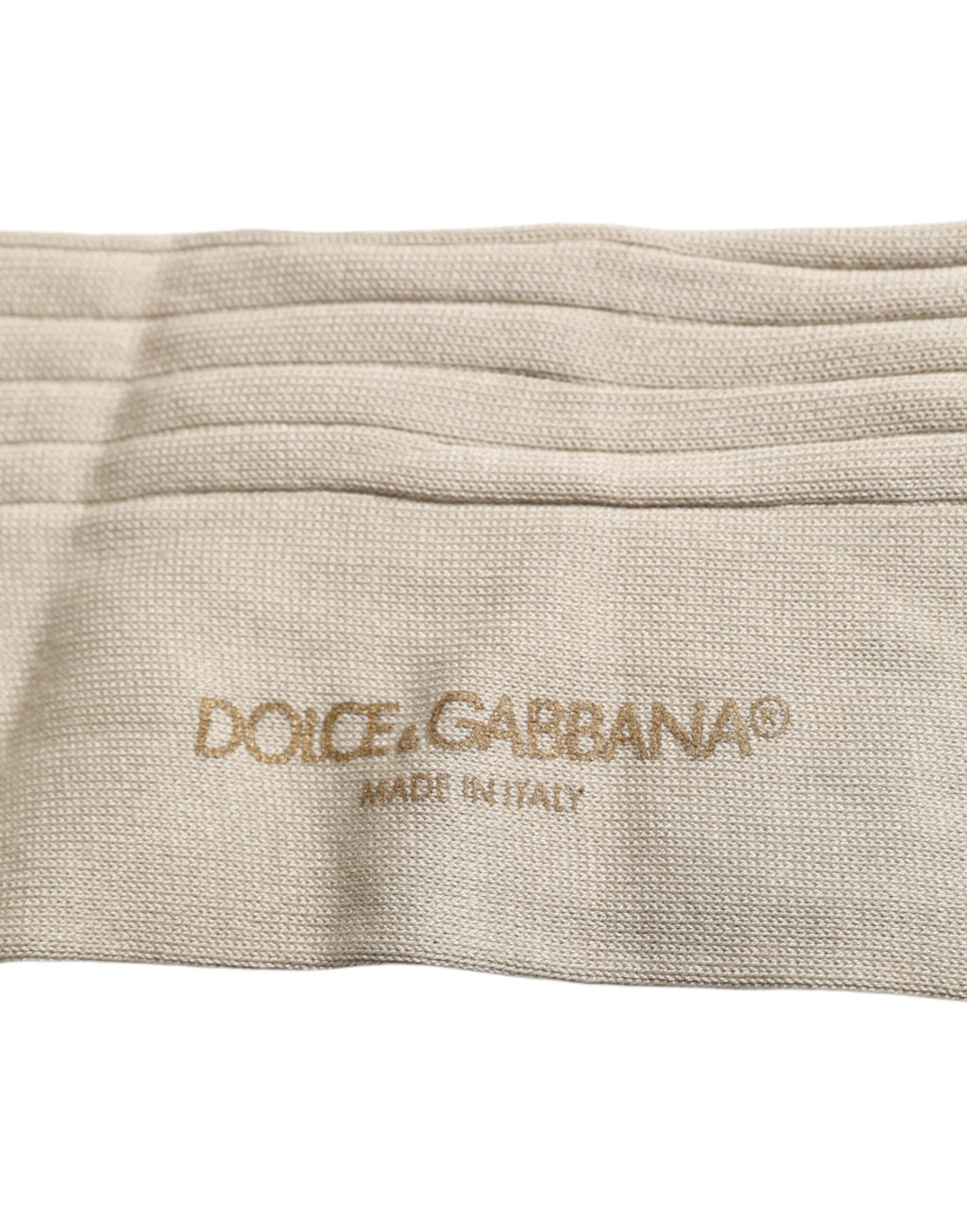 Chaussettes mi-mollet en coton stretch beige avec logo Dolce & Gabbana, style élégant et confortable.