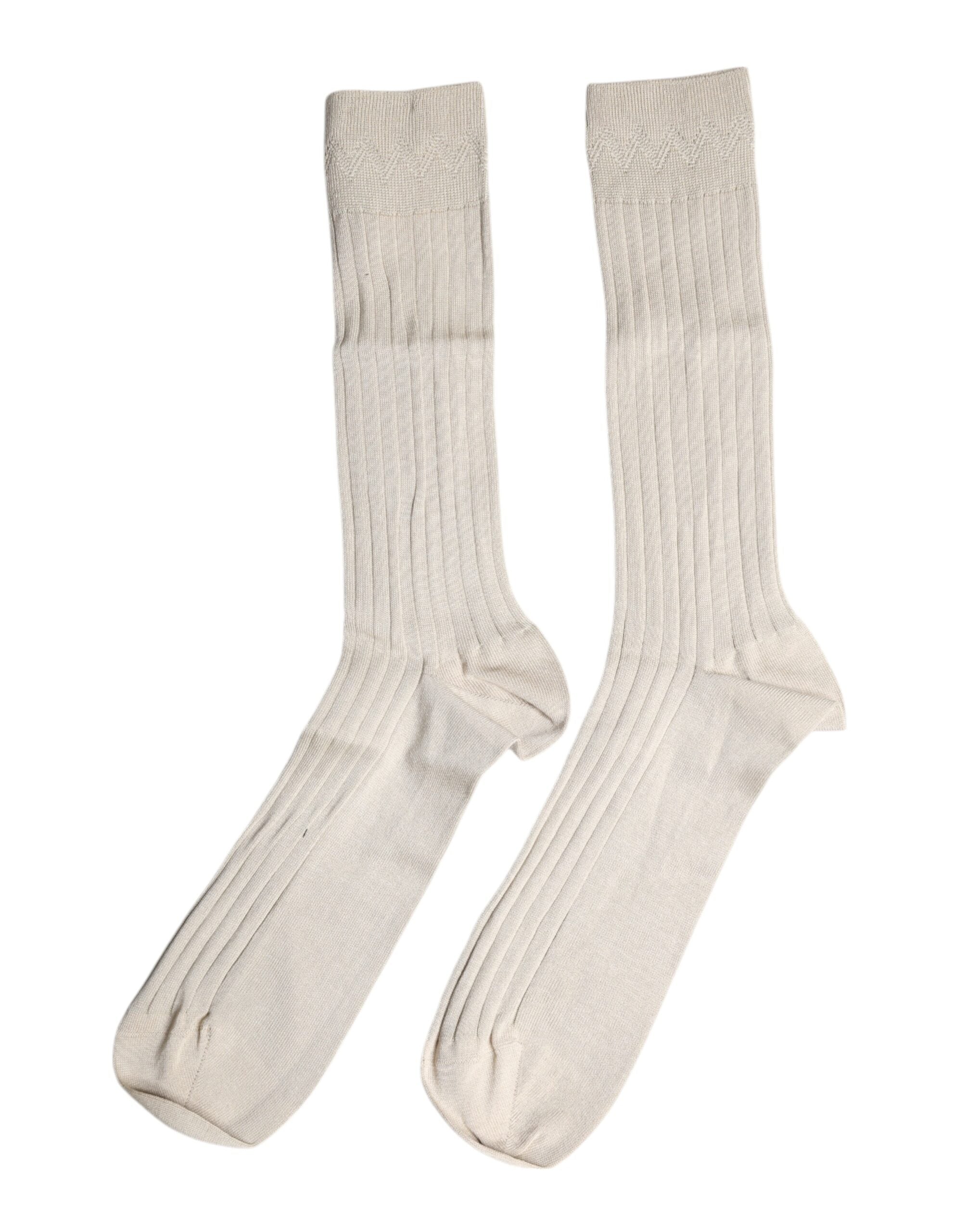 Chaussettes mi-mollet en coton stretch beige avec logo Dolce & Gabbana, mode élégante et confortable.