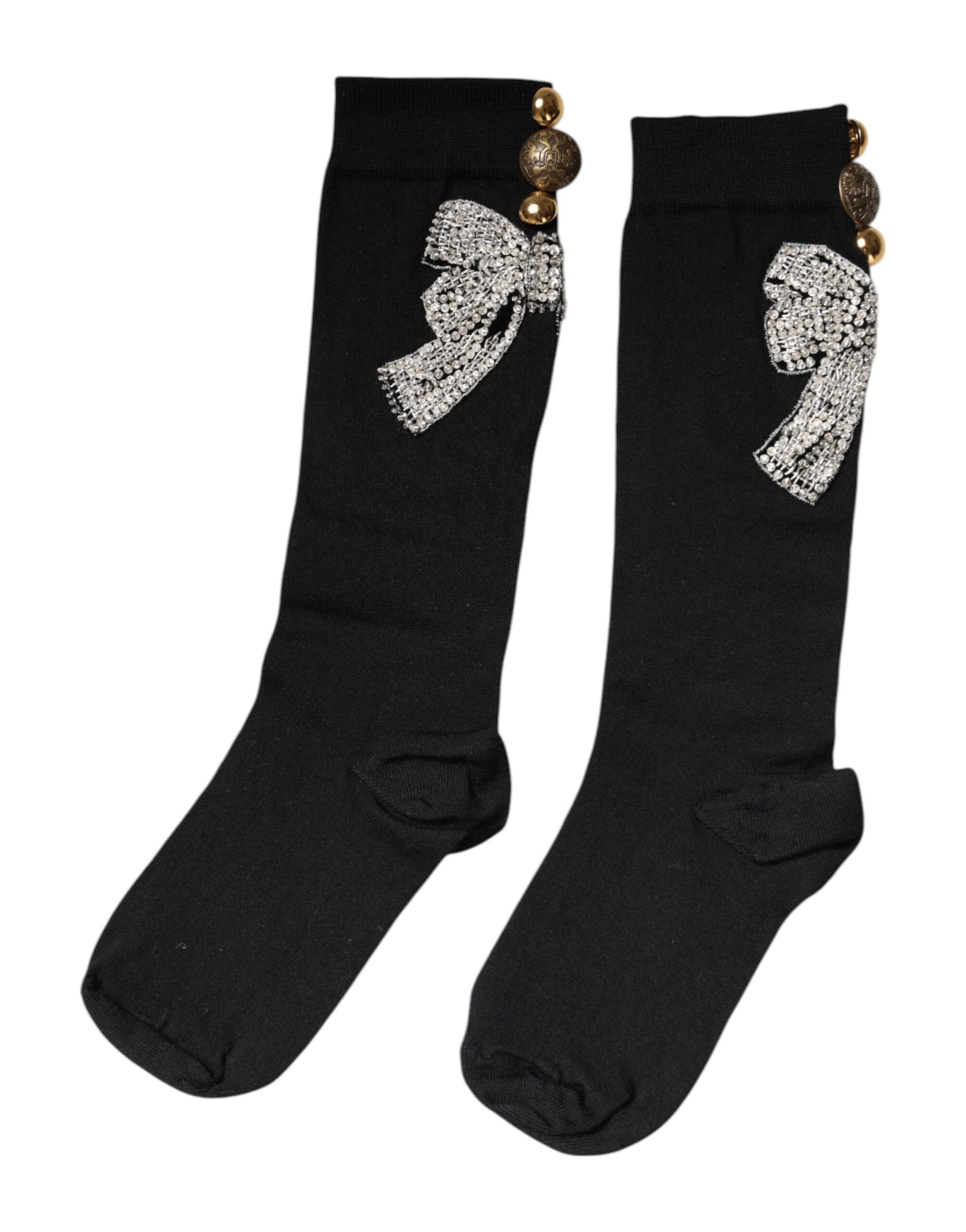 Chaussettes en maille noire Dolce & Gabbana avec embellissements floraux en cristal, style élégant et sophistiqué.