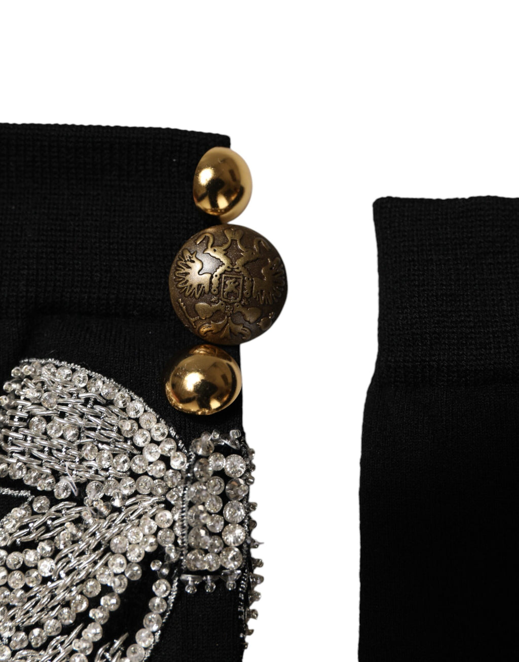 Chaussettes en tricot noir Dolce & Gabbana avec broderie florale et embellissements en cristal élégant.