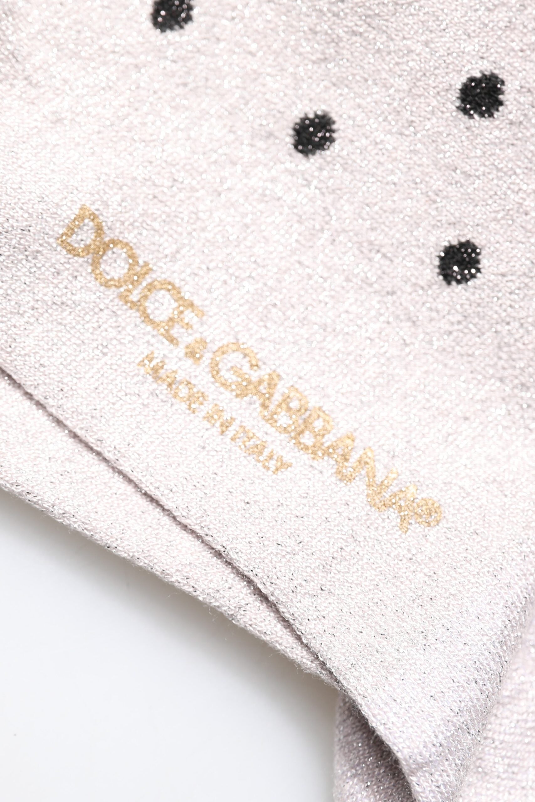 Chaussettes grises en viscose extensible à pois de la marque Dolce & Gabbana, design élégant et confortable.