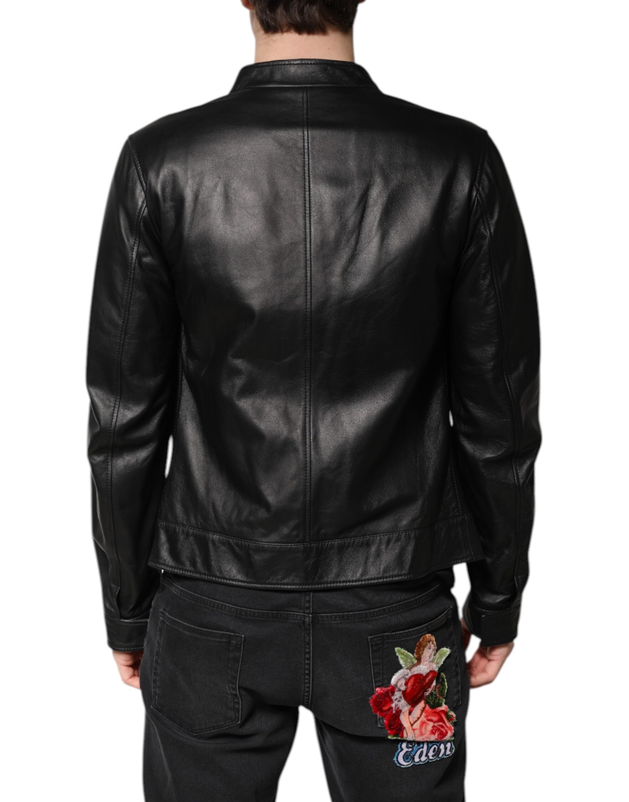 Veste en cuir noir Dolce & Gabbana avec fermeture éclair complète, motif mouton pour un style biker élégant.