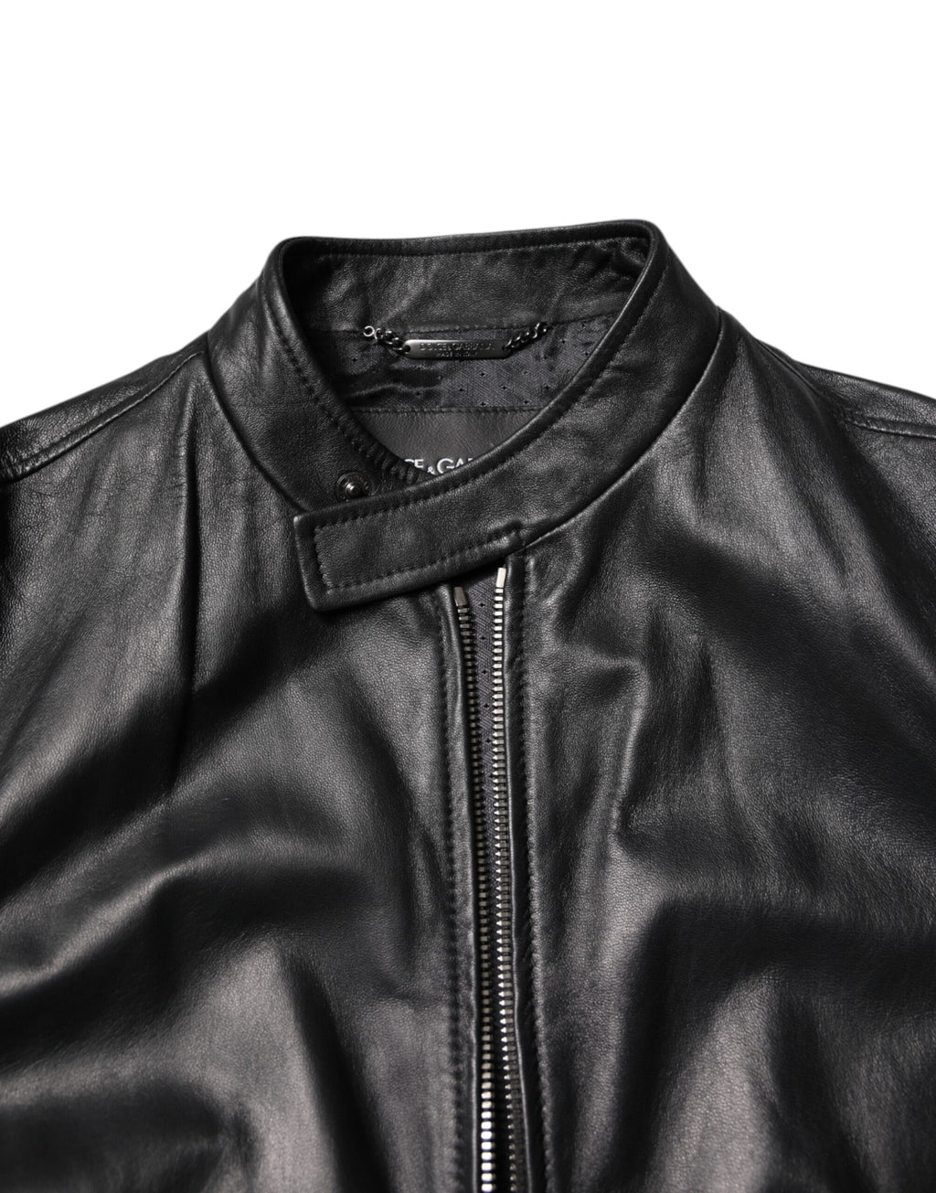 Veste biker en cuir noir Dolce & Gabbana, avec fermeture éclair complète et détails en laine d'agneau, style élégant et moderne.