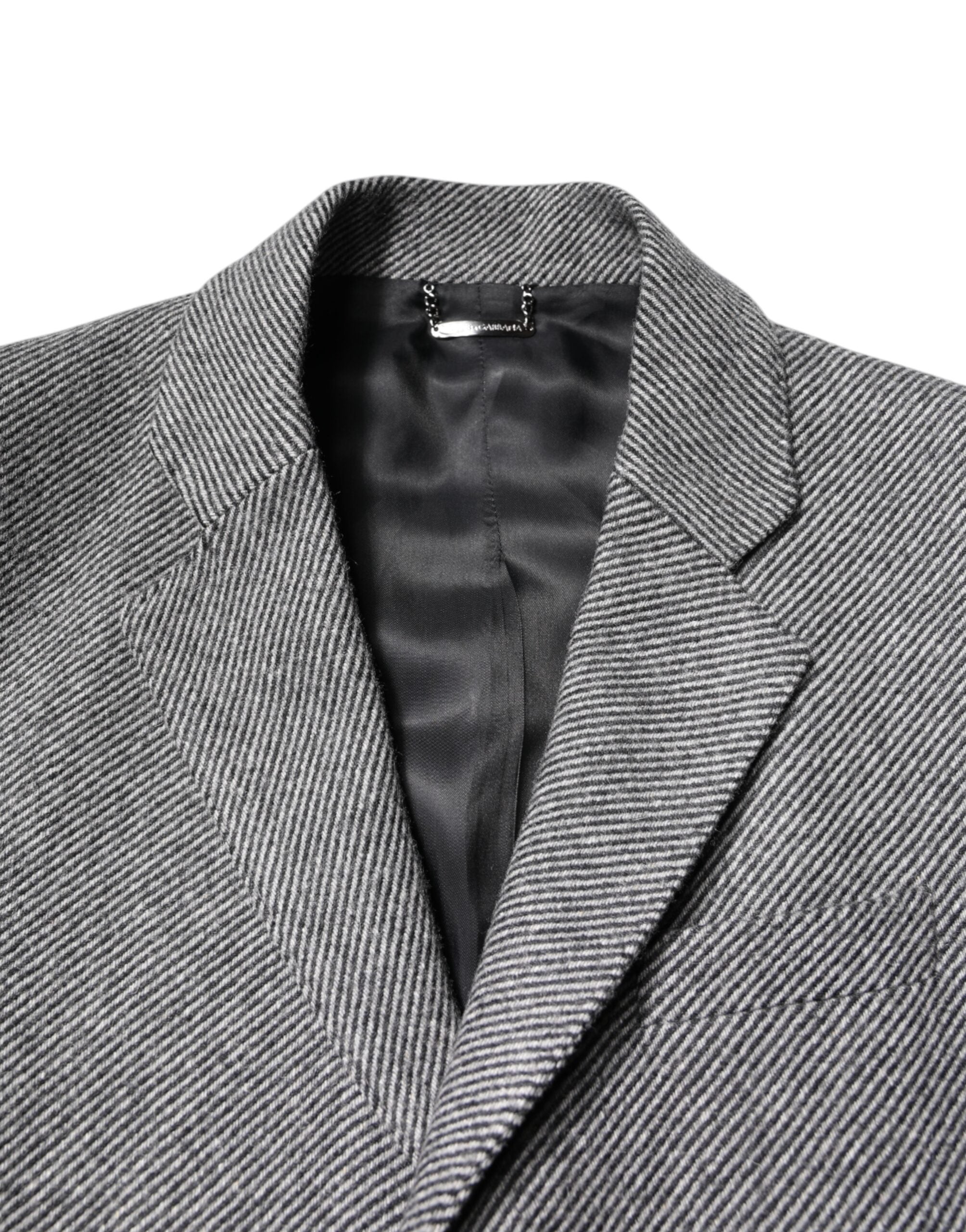 Manteau trench gris en laine Dolce & Gabbana, coupe simple boutonnage, tissu chaud et élégant, vue de face.