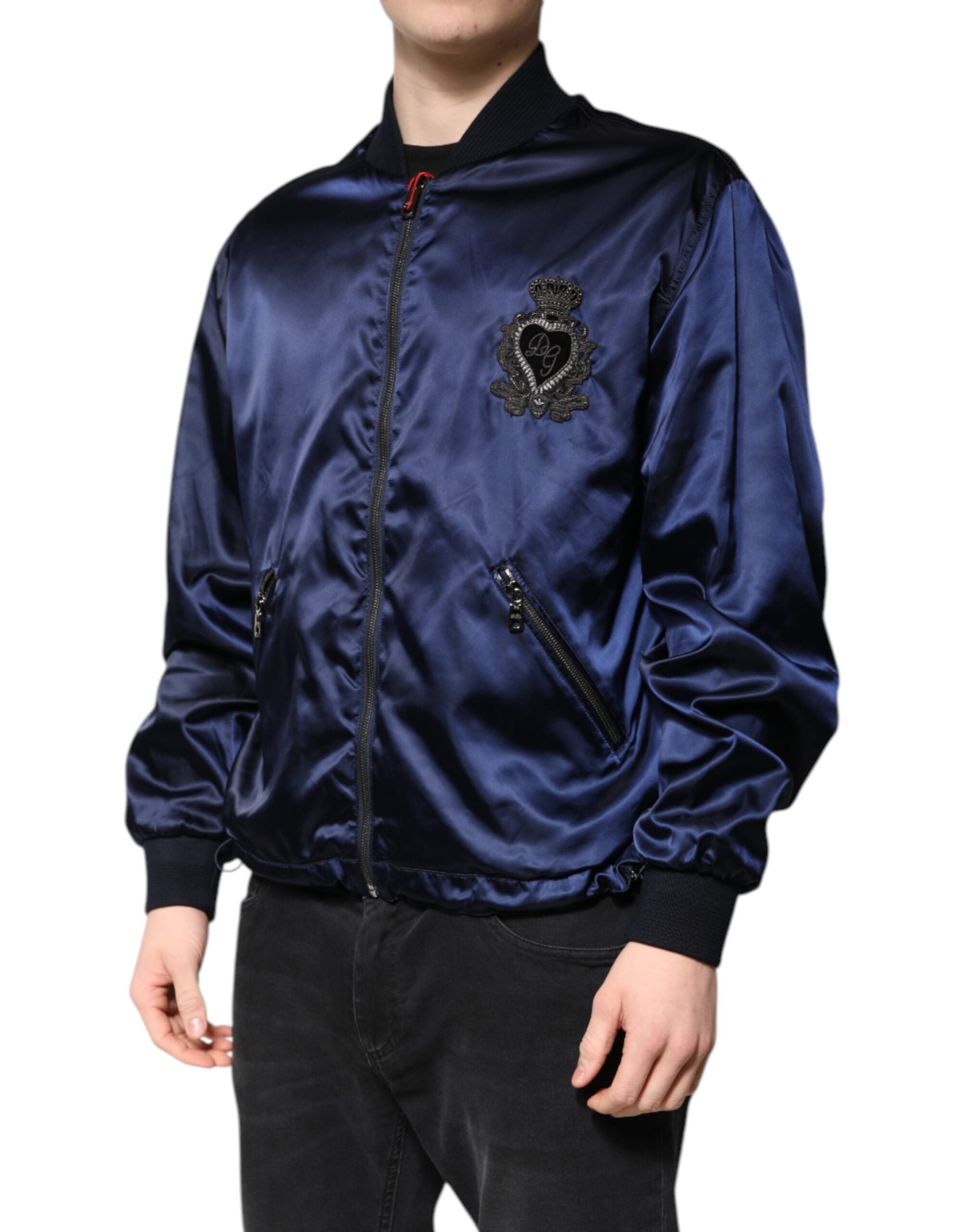 Veste bomber en nylon bleu Dolce & Gabbana avec fermeture éclair, motif couronne DG, style décontracté et moderne.