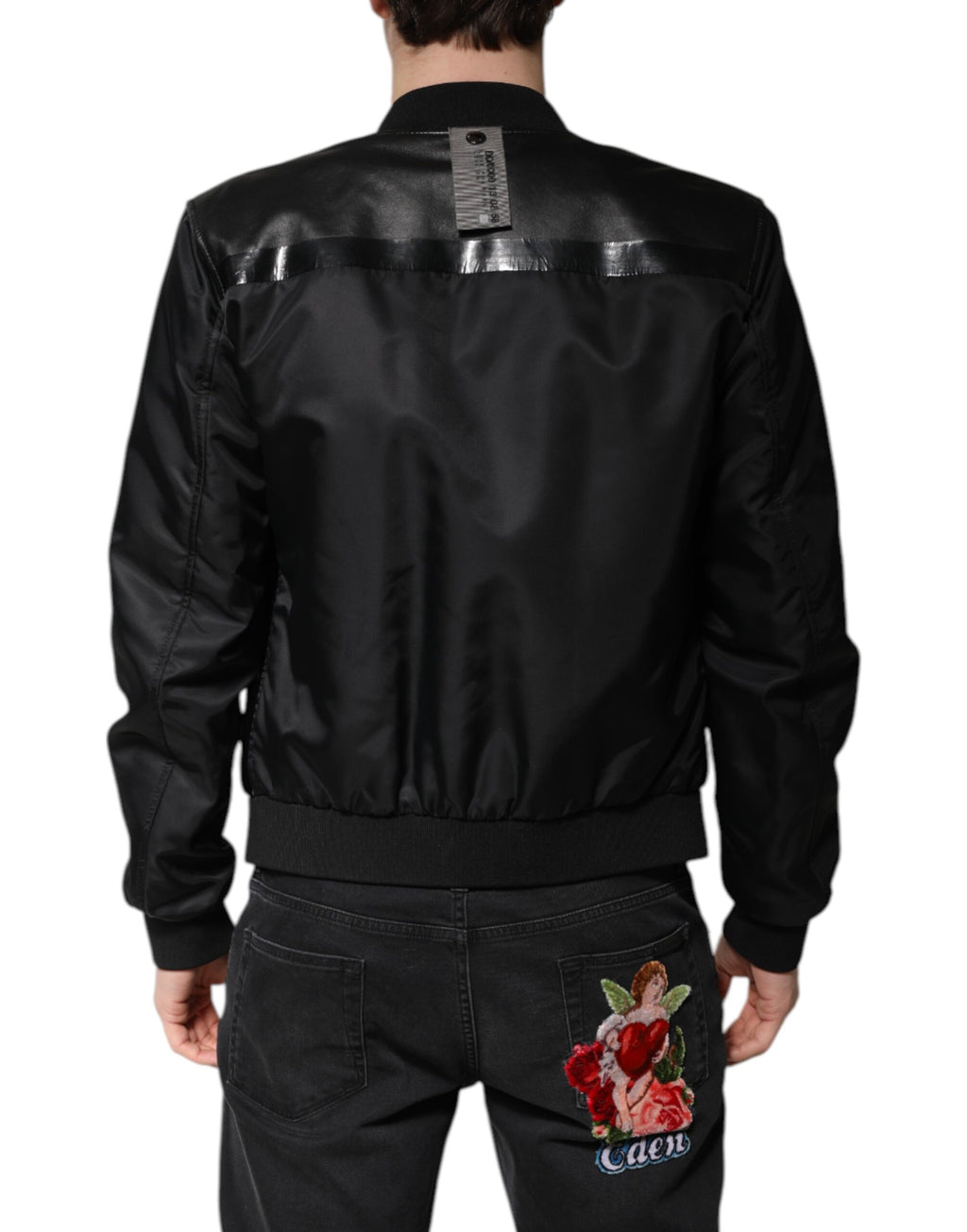 Veste en cuir d'agneau noir Dolce & Gabbana, blouson biker à fermeture éclair complète avec détails modernes.