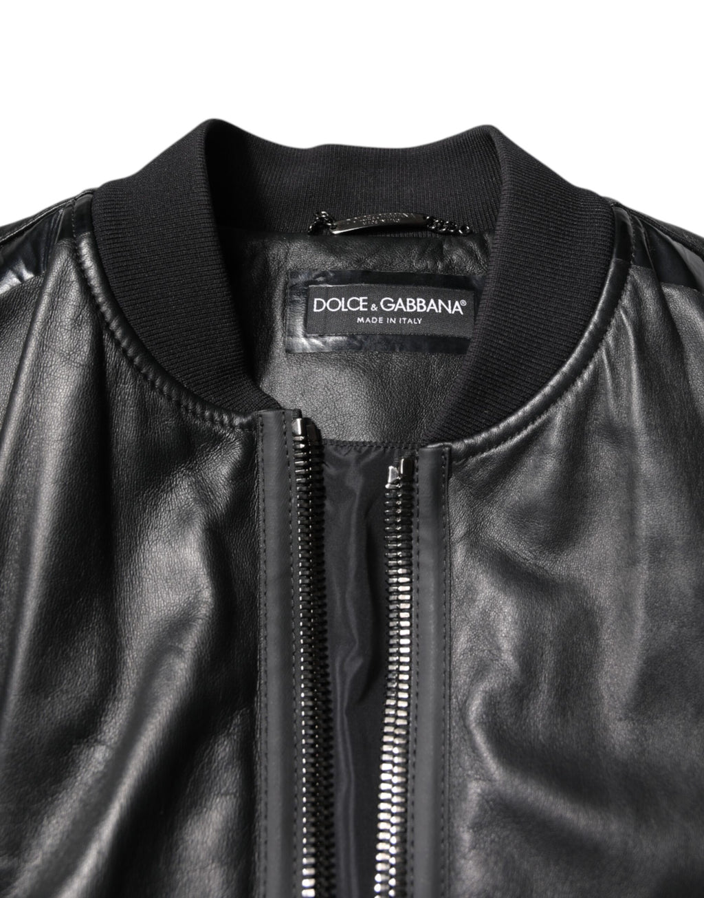 Veste en cuir d'agneau noir Dolce & Gabbana, veste motard à zip complet avec détails élégants et coupe ajustée.