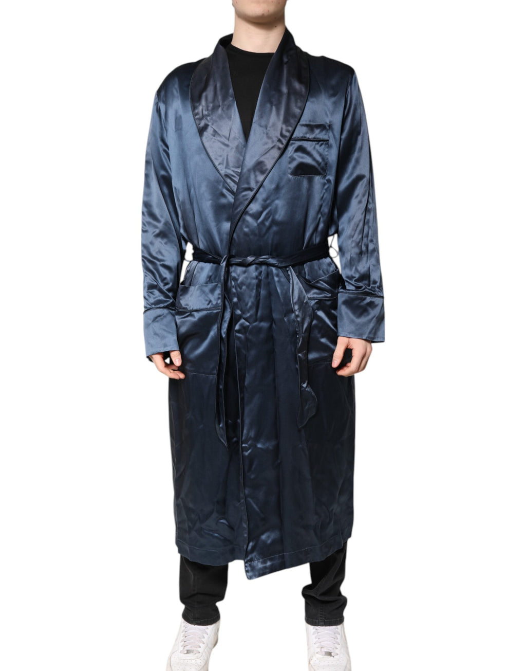 Robe ou veste homme Dolce & Gabbana en soie bleue unie, avec coupe élégante et détails raffinés.