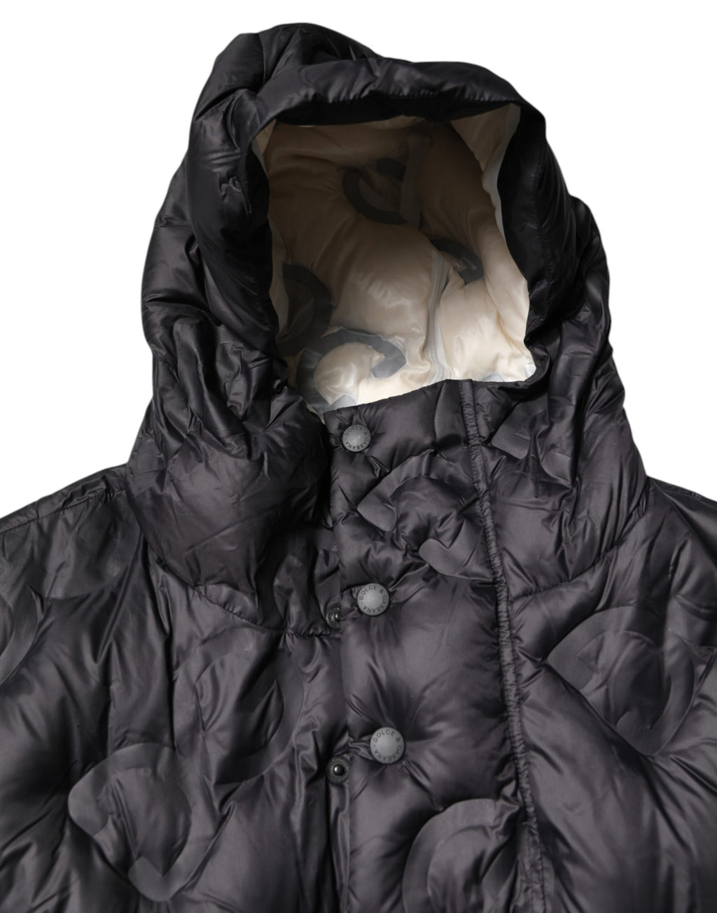 Veste d'hiver noire Dolce & Gabbana parka à capuche, coupe décontractée, idéale pour la saison froide, avec détails élégants.