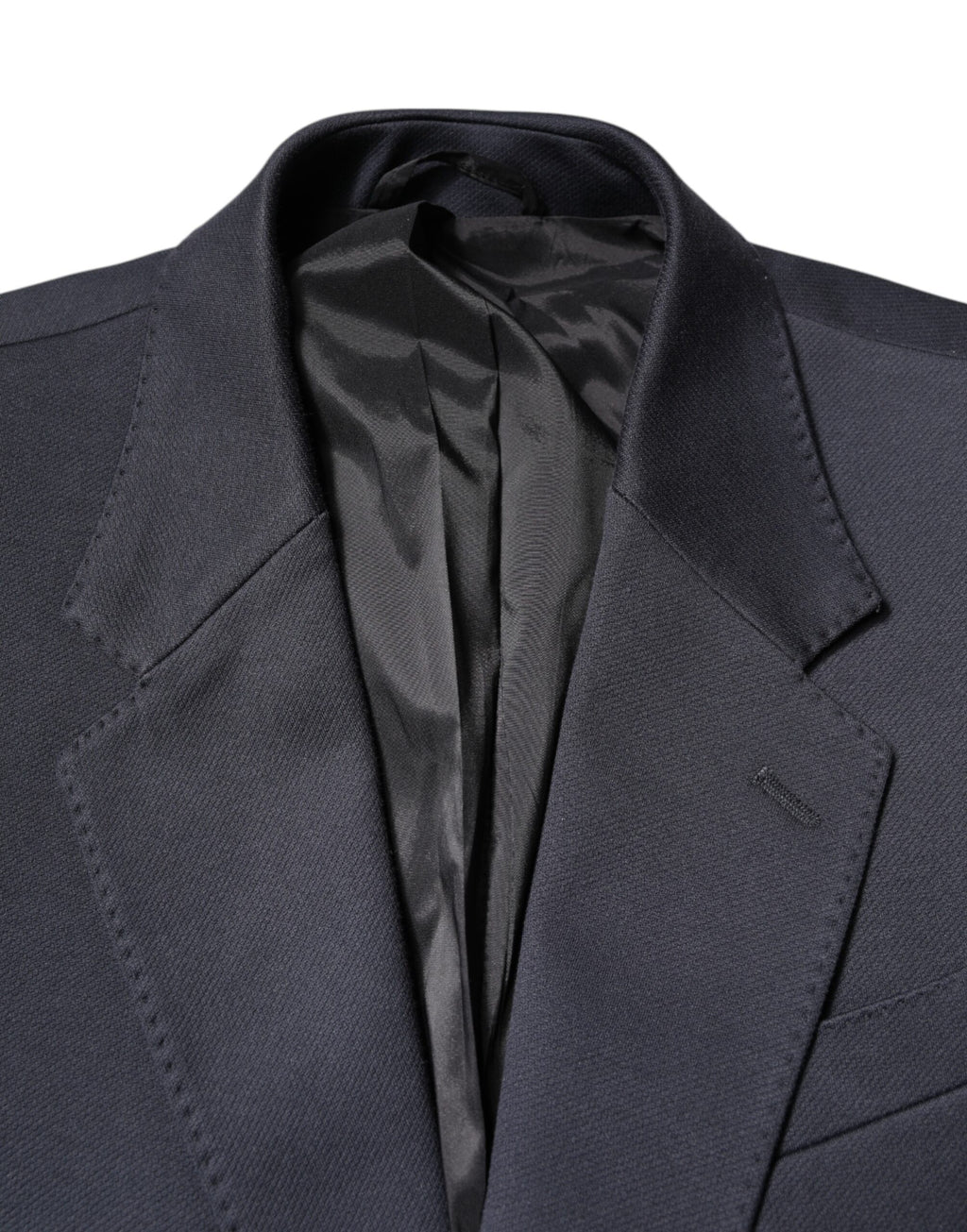 Veste blazer homme Dolce & Gabbana en coton bleu foncé, style élégant, ajustée, avec col classique et boutons visibles.