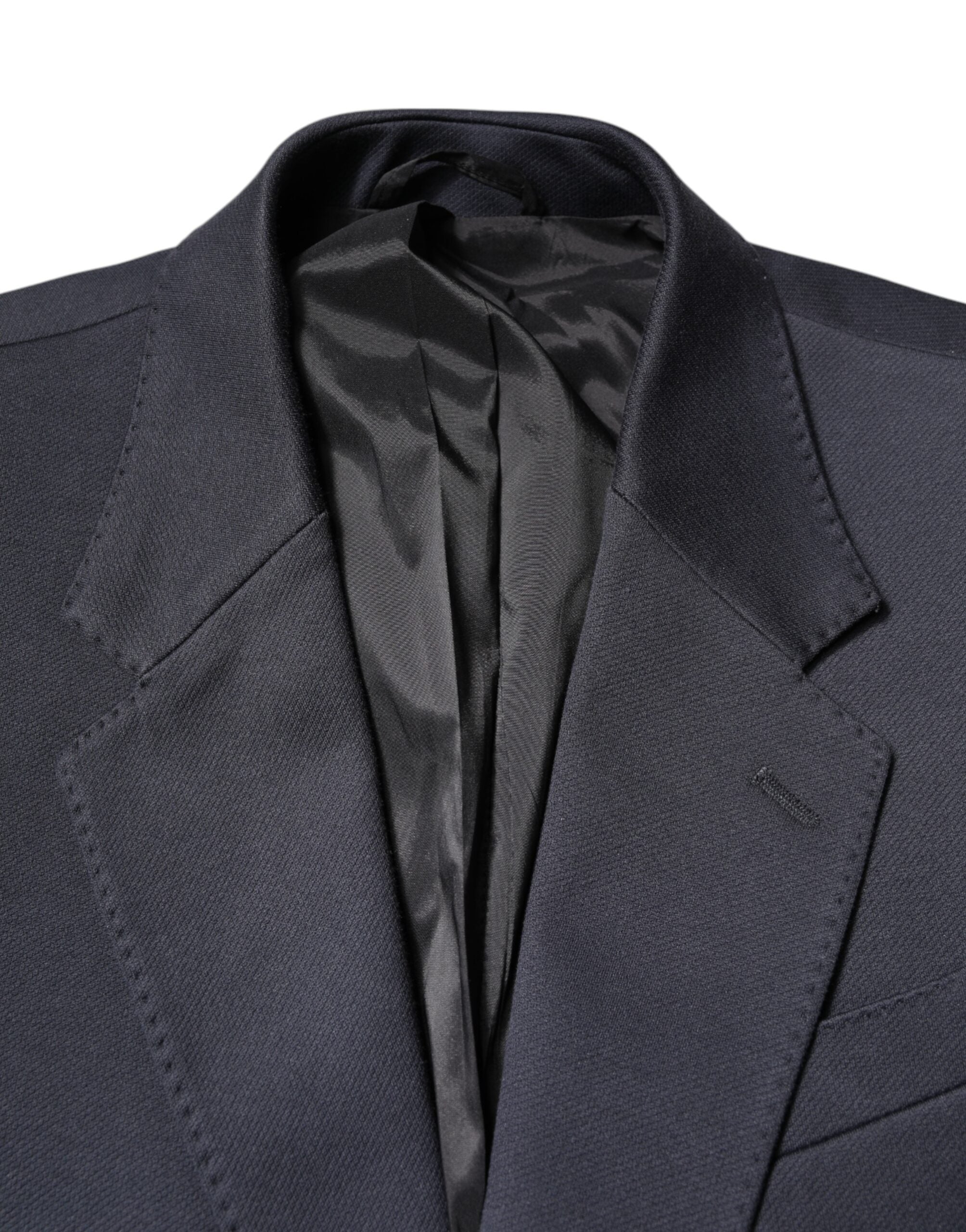 Veste blazer homme Dolce & Gabbana en coton bleu foncé, style élégant, ajustée, avec col classique et boutons visibles.