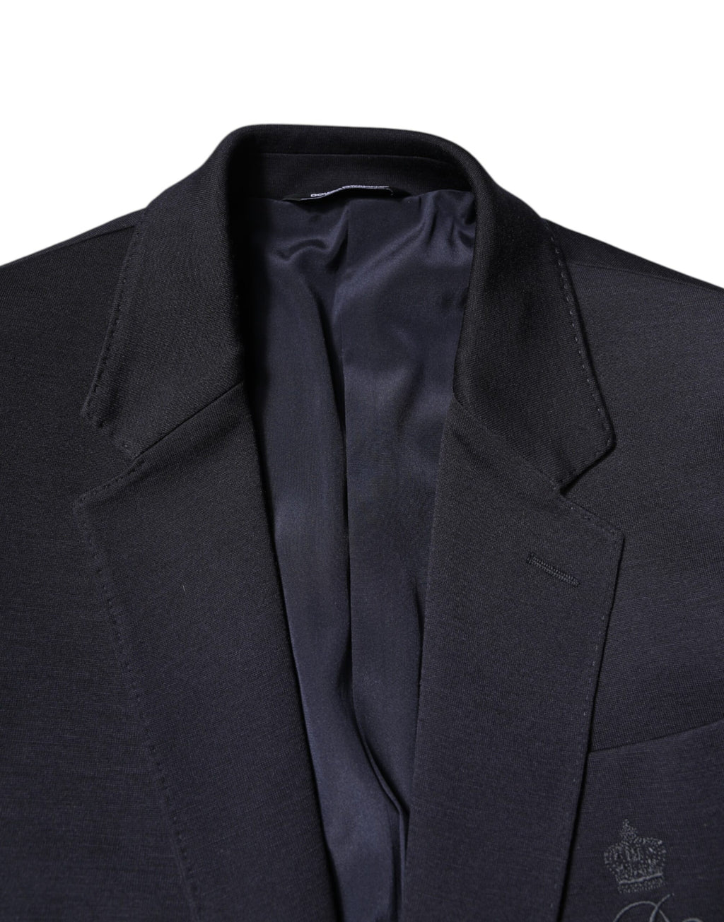Veste blazer pour homme Dolce & Gabbana en laine noire, coupe simple à un bouton, style élégant et classique.