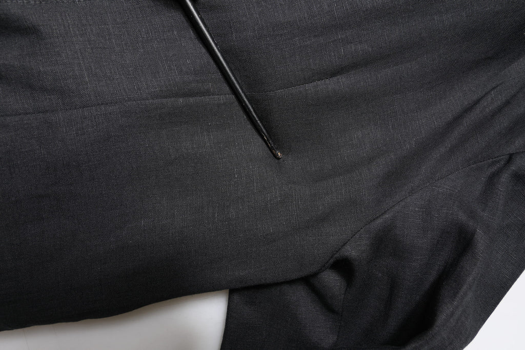 Manteau homme en lin noir Dolce & Gabbana, blazer à simple boutonnage, design élégant et moderne.