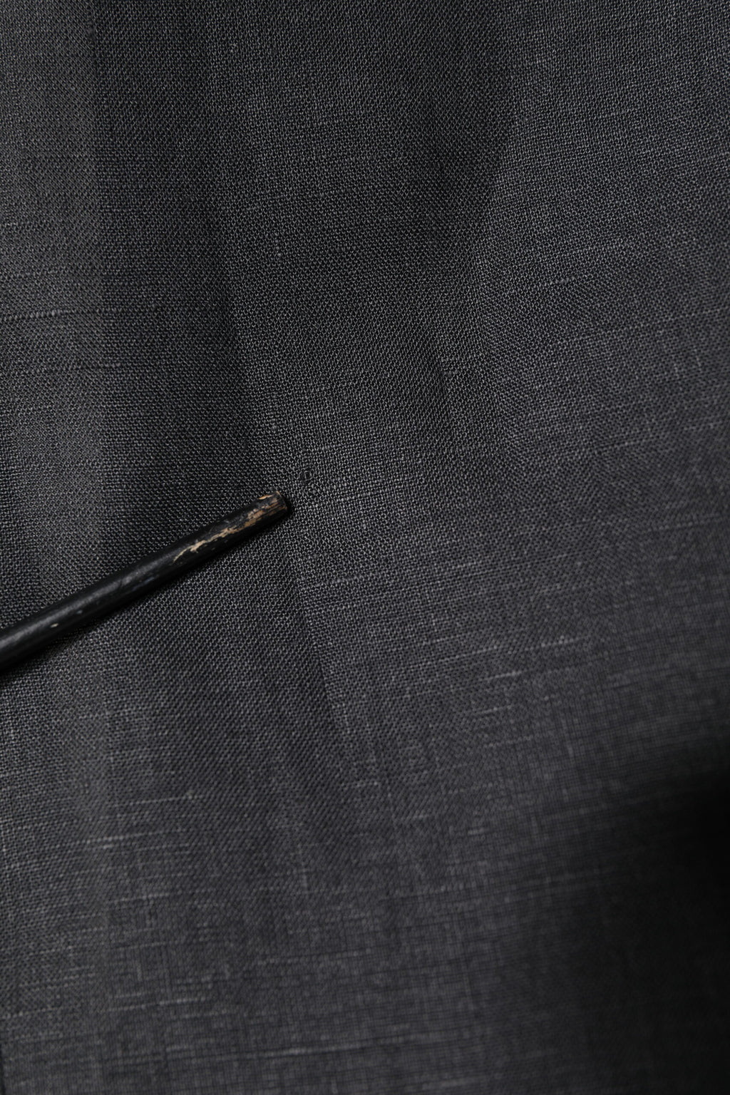 Manteau homme Dolce & Gabbana en lin noir, blazer simple boutonnage, élégant et classique, vue de face sur fond blanc.