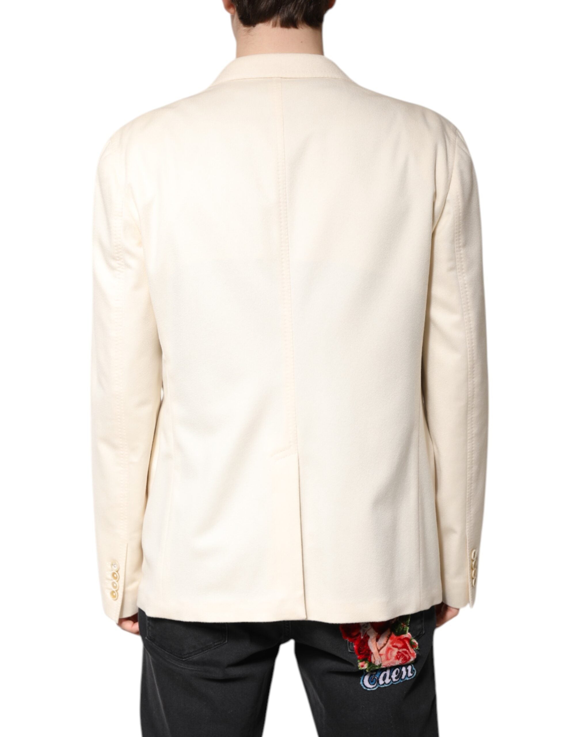 Manteau blazer beige en cachemire Dolce & Gabbana à double boutonnage, élégant et chaud, porté sur un mannequin.