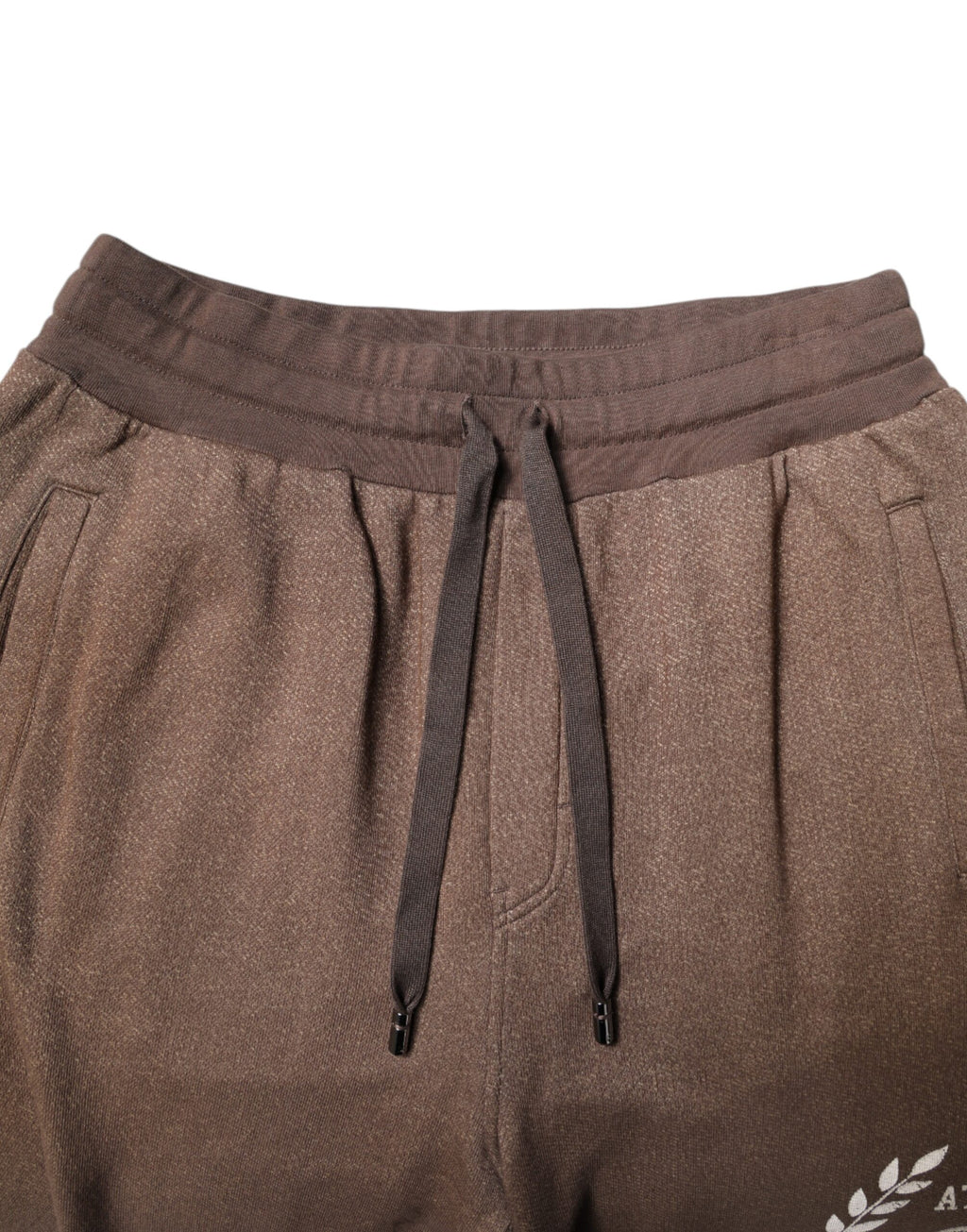 Pantalon jogging Dolce & Gabbana en coton marron, style décontracté avec ceinture élastique et poches latérales.