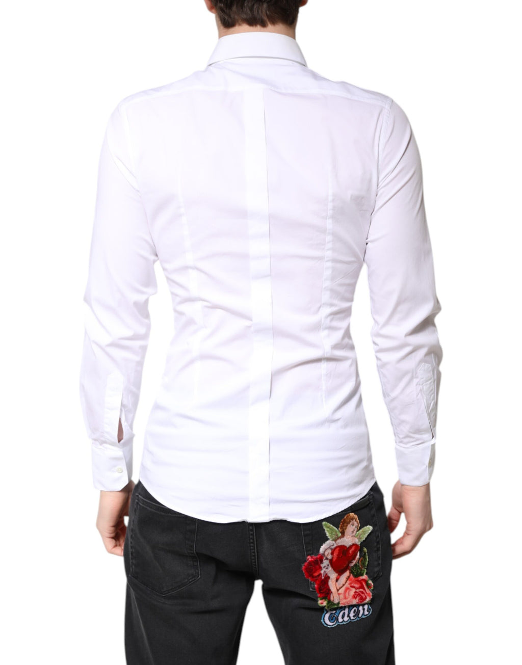 Chemise blanche en coton Dolce & Gabbana, robe formelle avec col, détails dorés visibles sur l'image.