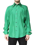 Chemise longue en satin de soie verte de Dolce & Gabbana avec manches longues, style décontracté et élégant.