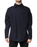 Chemise longue en coton bleu foncé de Dolce & Gabbana, avec manches longues et design élégant, vue de face.