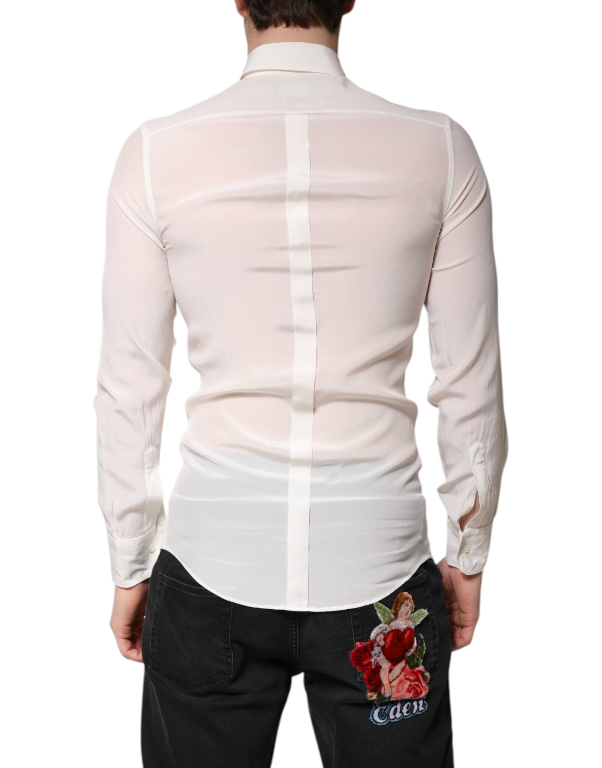 Chemise blanche en soie Dolce & Gabbana, robe formelle avec col or et détails élégants visible sur l'image.