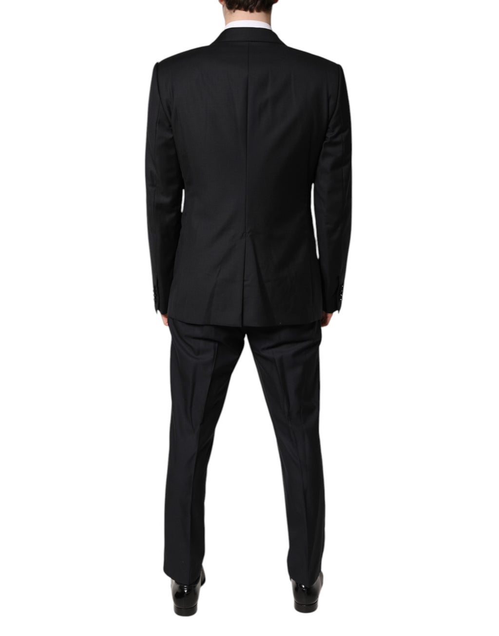 Costume trois pièces noir Dolce & Gabbana en laine, veste croisée à double boutonnage, pantalon et veste assortis.