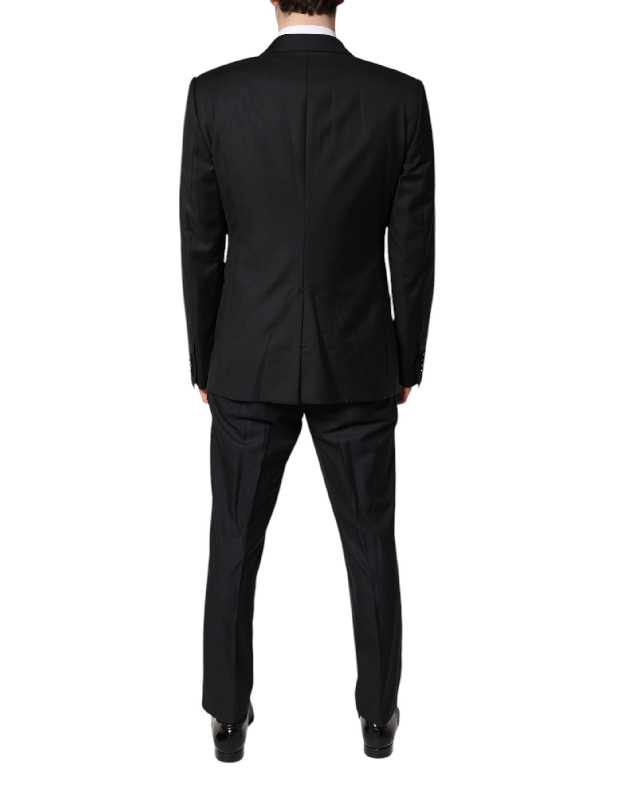 Costume trois pièces noir Dolce & Gabbana en laine, veste croisée à double boutonnage, pantalon et veste assortis.