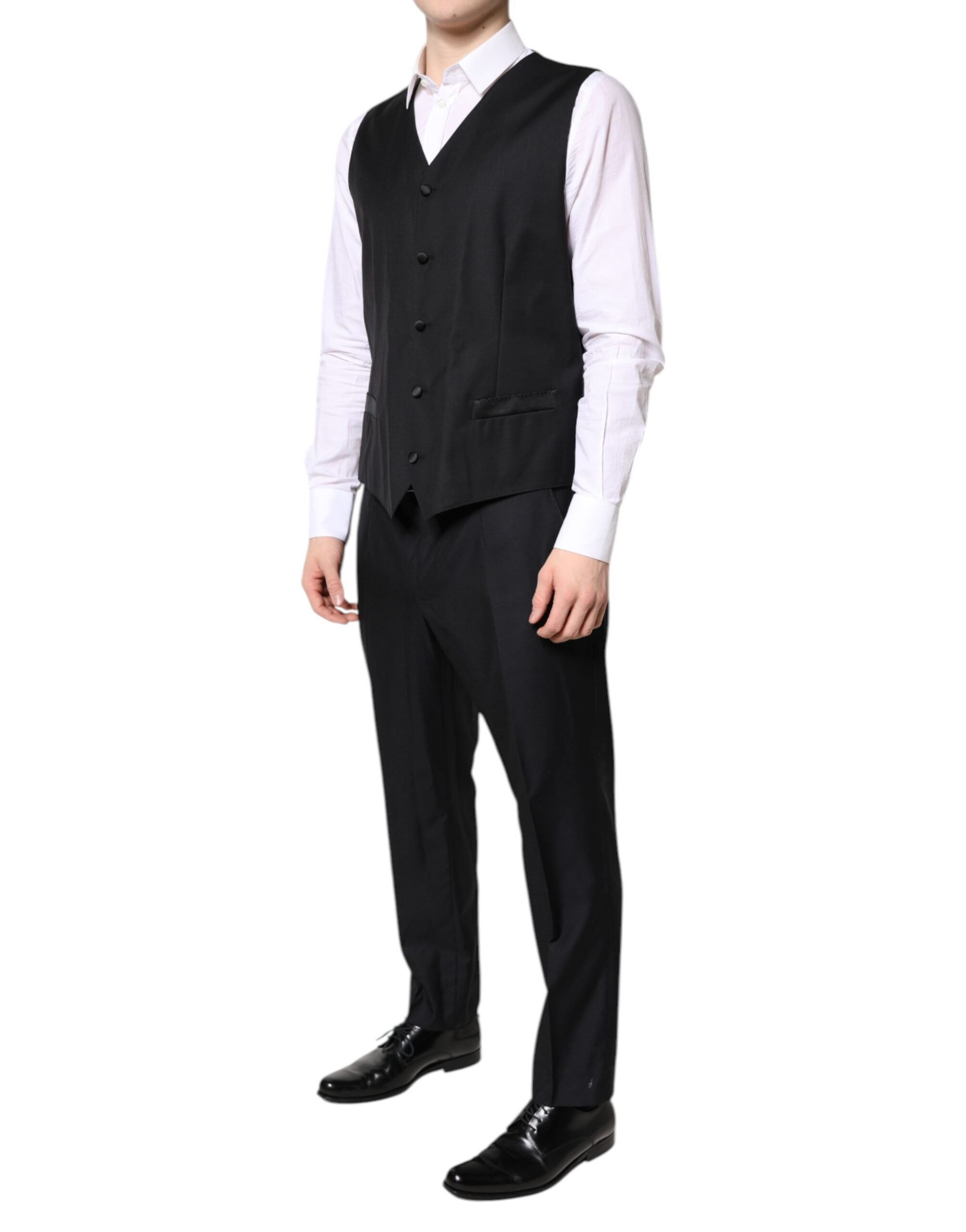 Costume formel trois pièces noir Dolce & Gabbana à double boutonnage, veste, pantalon et gilet élégants.