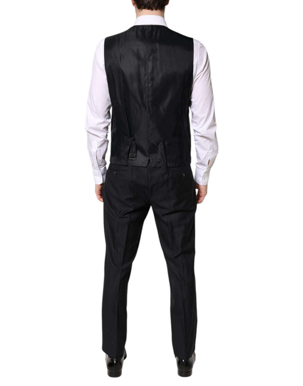 Costume formel noir Dolce & Gabbana à trois pièces avec double boutonnage, veste, pantalon et gilet élégants.