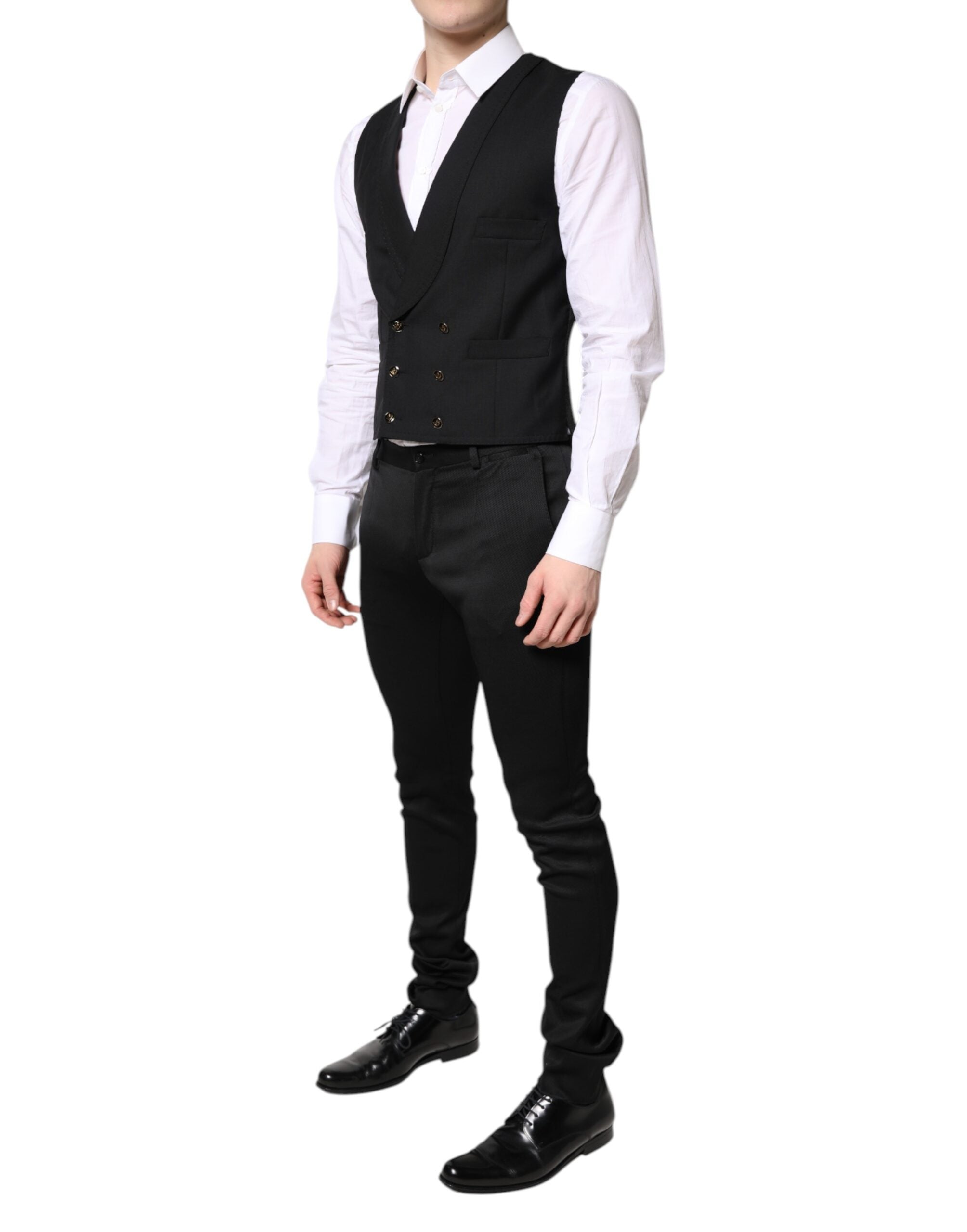 Blazer formel noir à un bouton avec gilet assorti de la marque Dolce & Gabbana, élégant pour occasions formelles.