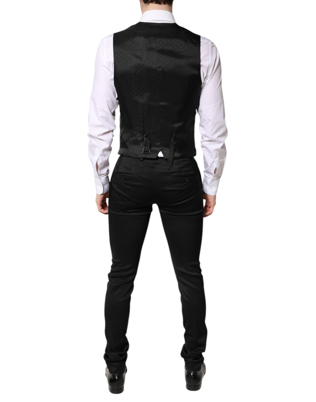 Veste de costume noire Dolce & Gabbana à un bouton avec gilet assorti, style formel et élégant pour homme.