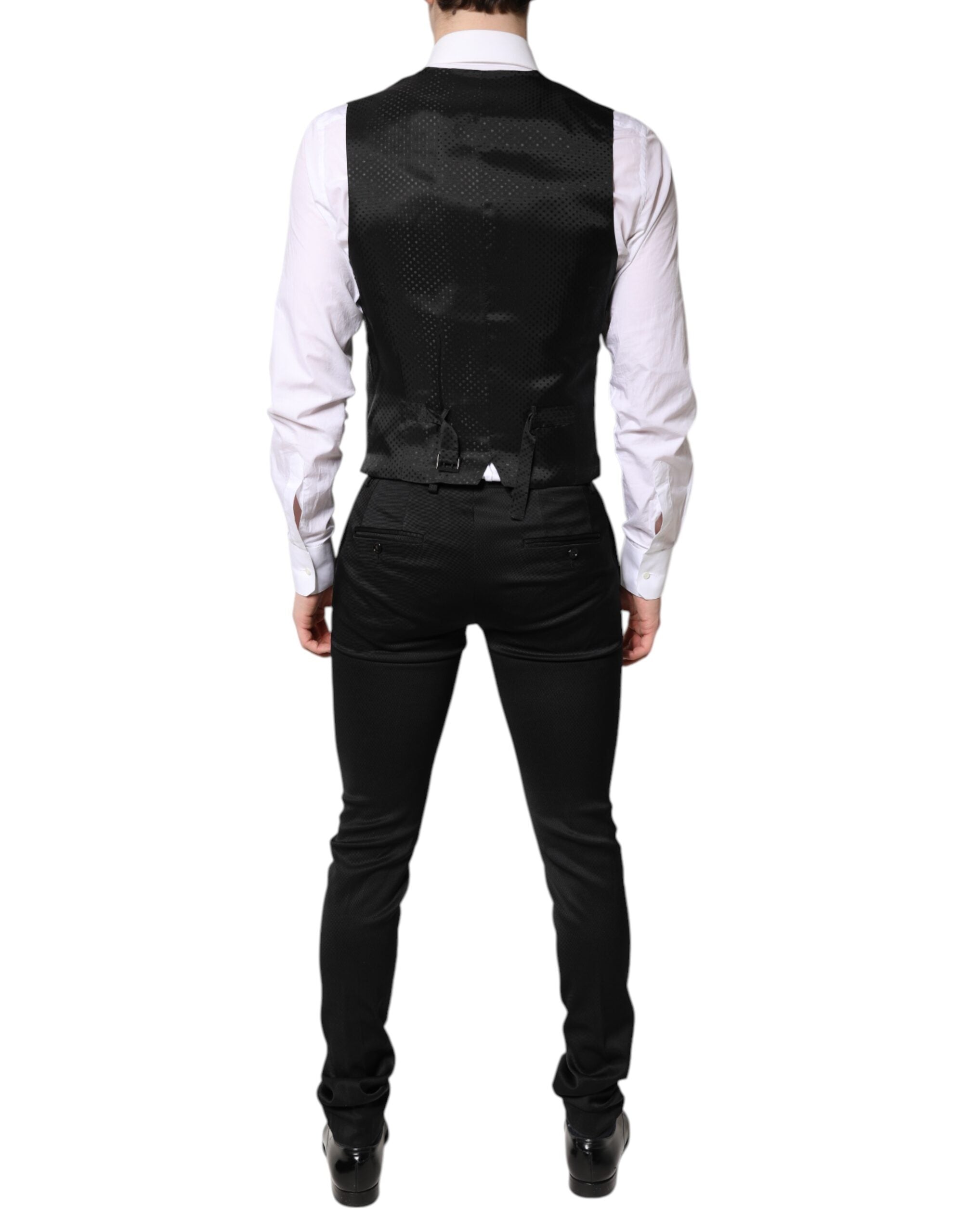 Veste de costume noire Dolce & Gabbana à un bouton avec gilet assorti, style formel et élégant pour homme.