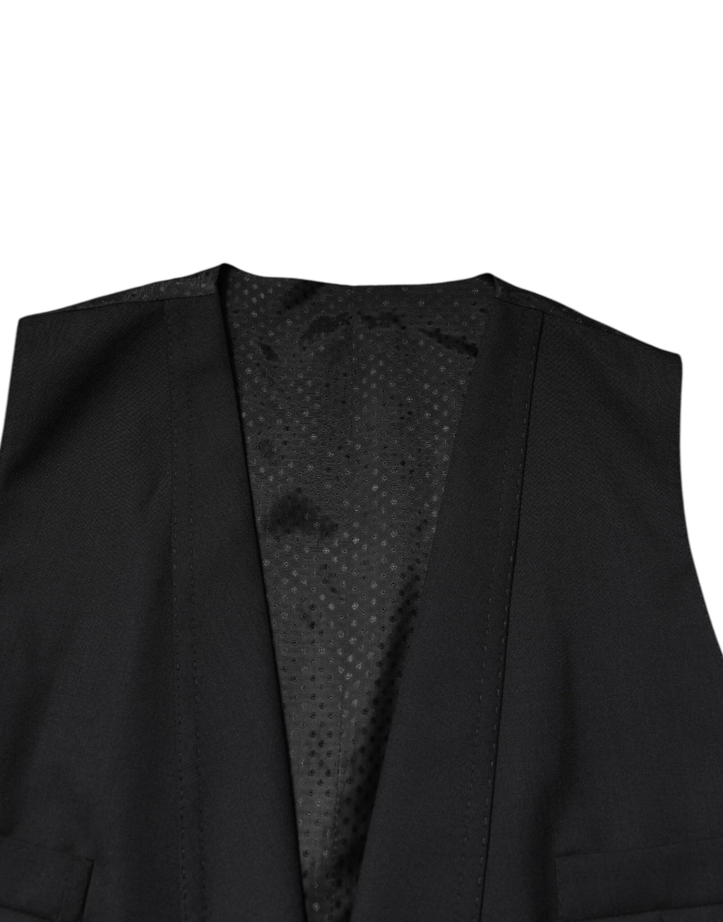 Veste de costume noire à un seul bouton avec gilet assorti de la marque Dolce & Gabbana, élégante et formelle.