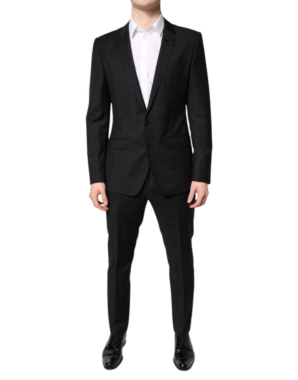 Costume deux pièces en laine noire Dolce & Gabbana, veste à double boutonnage et pantalon assorti, élégant et classique.