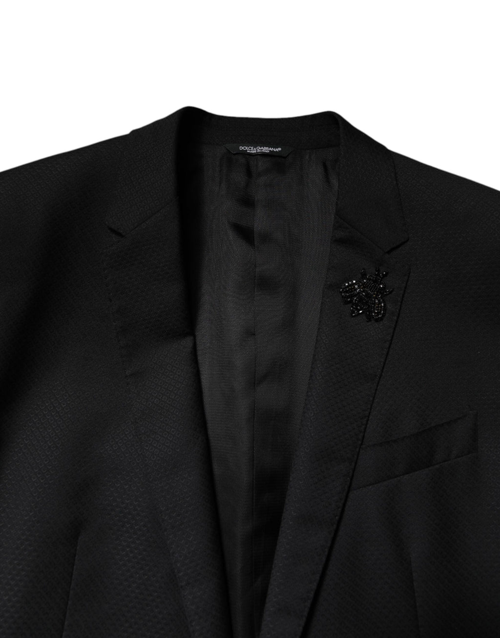 Costume en laine noire Dolce & Gabbana à double boutonnage avec veste et pantalon, élégant et classique.