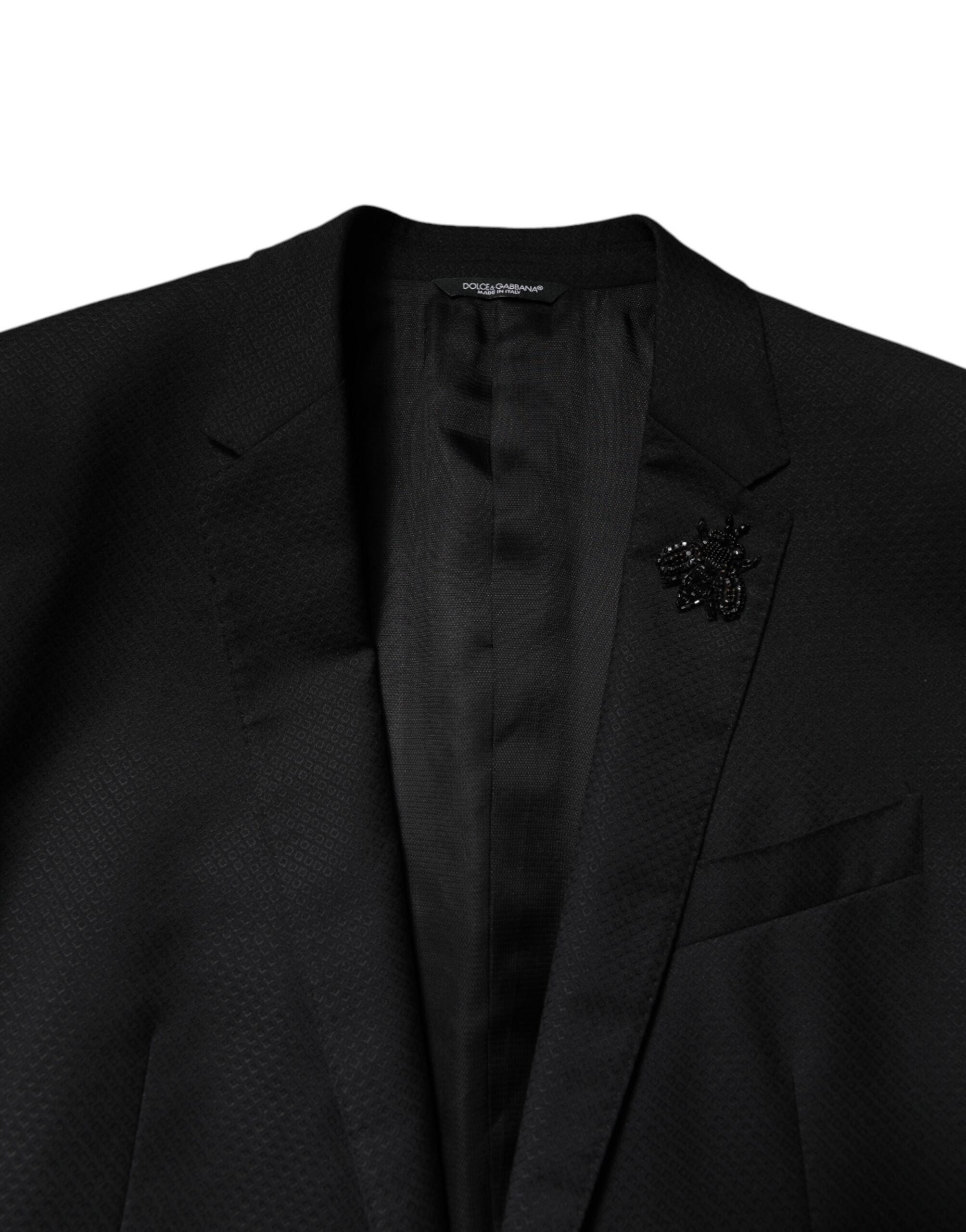 Costume en laine noire Dolce & Gabbana à double boutonnage avec veste et pantalon, élégant et classique.