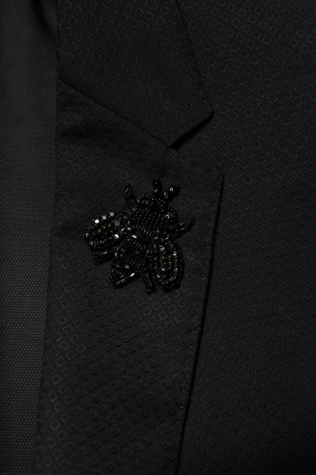 Costume deux pièces en laine noire Dolce & Gabbana, veste à double boutonnage et pantalon assorti, élégant et classique.