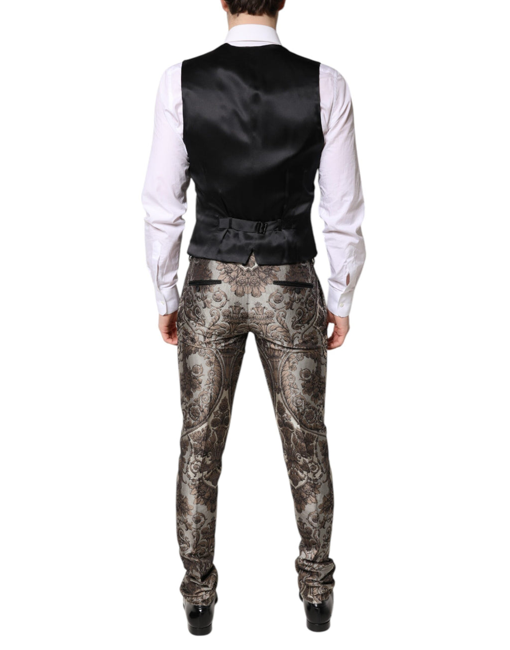 Costume trois pièces Dolce & Gabbana en jacquard multicolore, comprenant veste, pantalon et gilet, avec coupe élégante et détails sophistiqués.