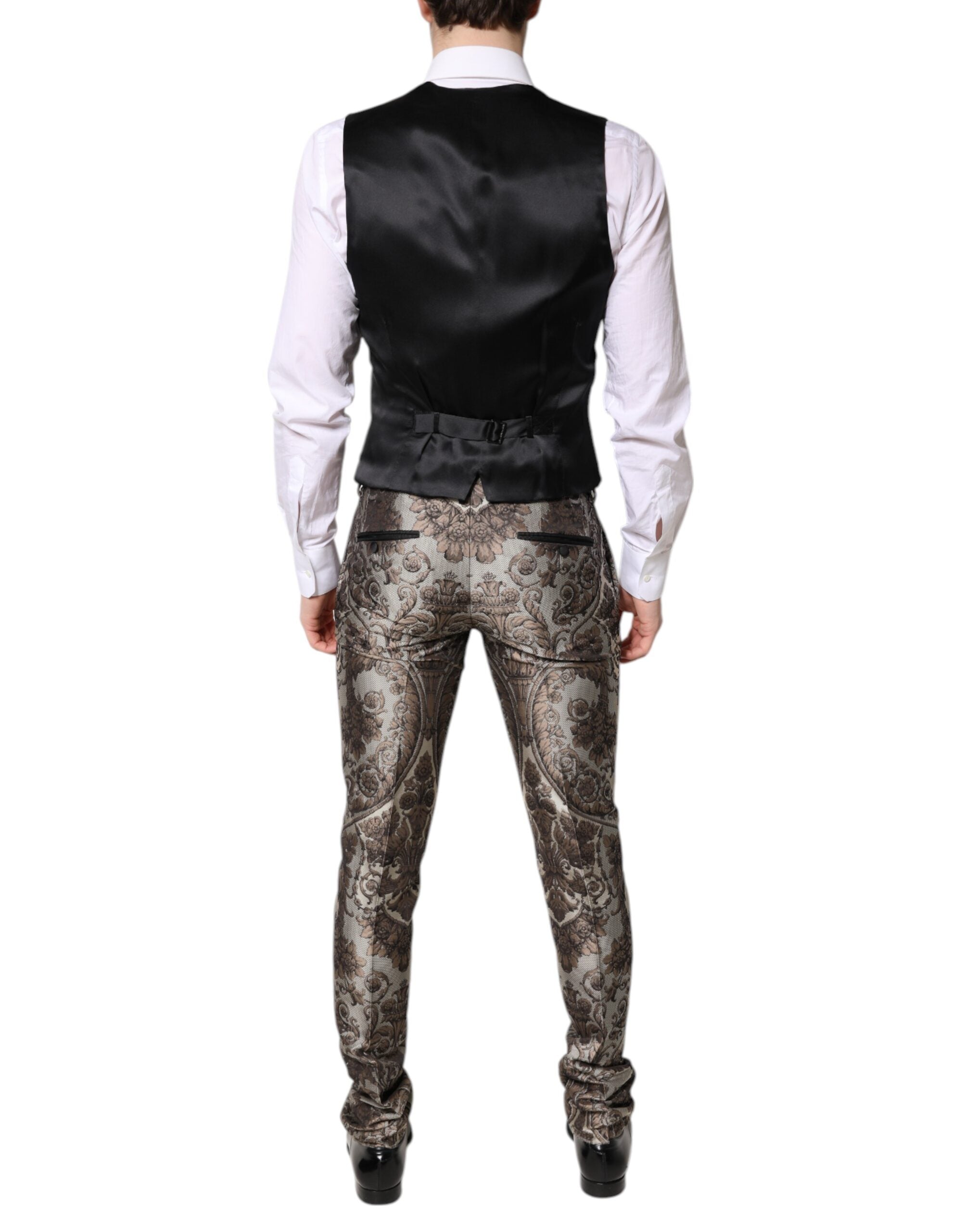 Costume trois pièces Dolce & Gabbana en jacquard multicolore, comprenant veste, pantalon et gilet, avec coupe élégante et détails sophistiqués.