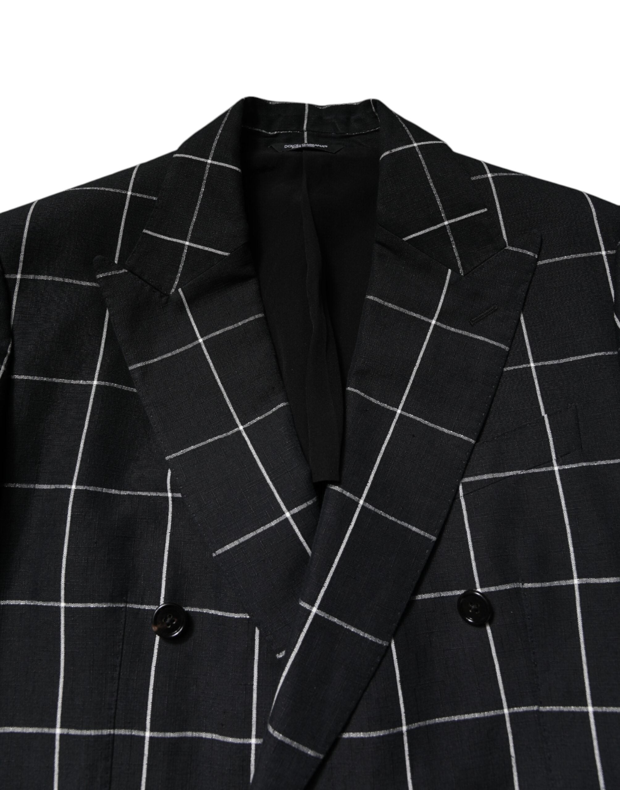 Costume deux pièces noir Dolce & Gabbana Taormina à double boutonnage, élégant et moderne, adapté pour occasions formelles.