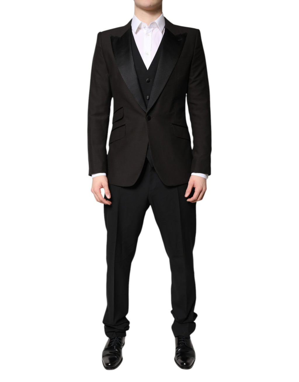 Costume formel trois pièces noir Dolce & Gabbana, veste croisée, pantalon et gilet, élégant et classique.