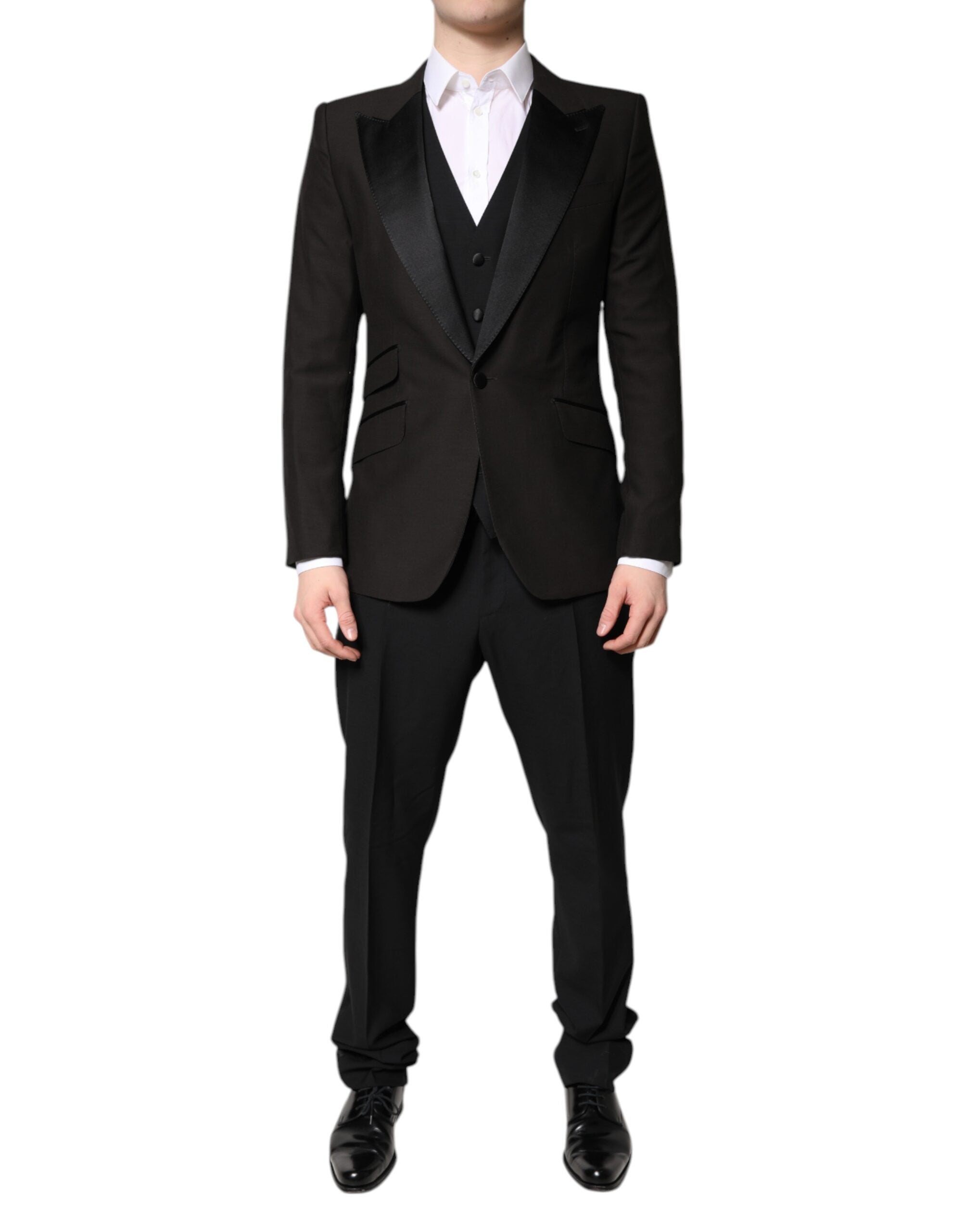 Costume formel trois pièces noir Dolce & Gabbana, veste croisée, pantalon et gilet, élégant et classique.