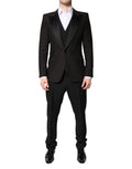 Costume formel noir trois pièces de Dolce & Gabbana, veste à un bouton, pantalon et veste assortis, élégant et sophistiqué.