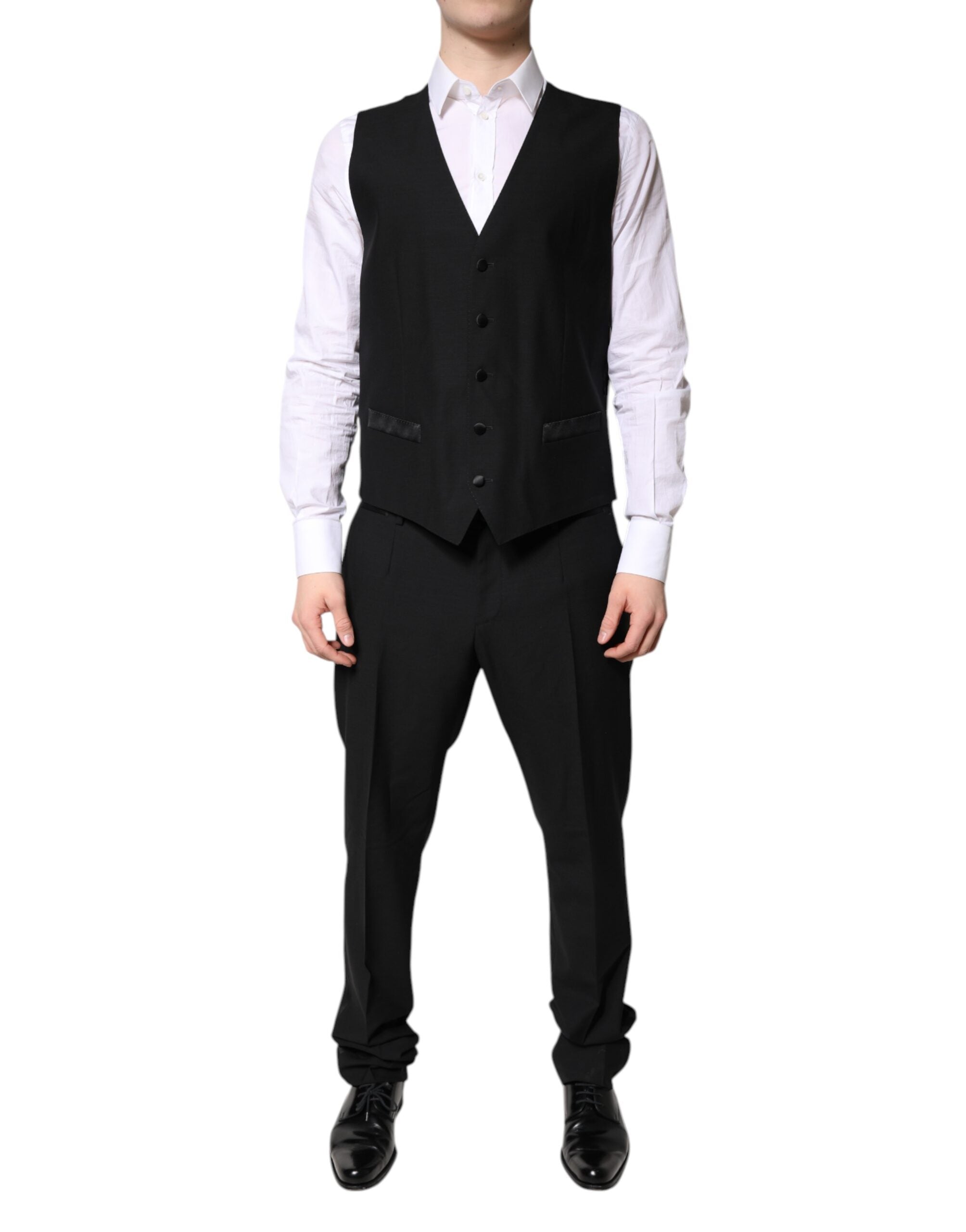 Costume formel noir à trois pièces Dolce & Gabbana, veste à un bouton, pantalon et gilet élégants, pour occasion spéciale.
