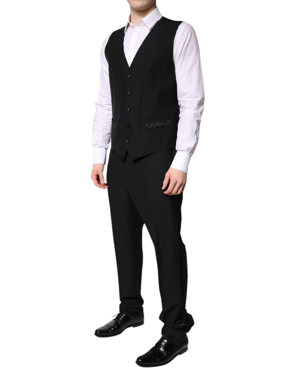 Costume formel noir Dolce & Gabbana en 3 pièces, veste à un seul bouton, pantalon et gilet élégants pour homme.