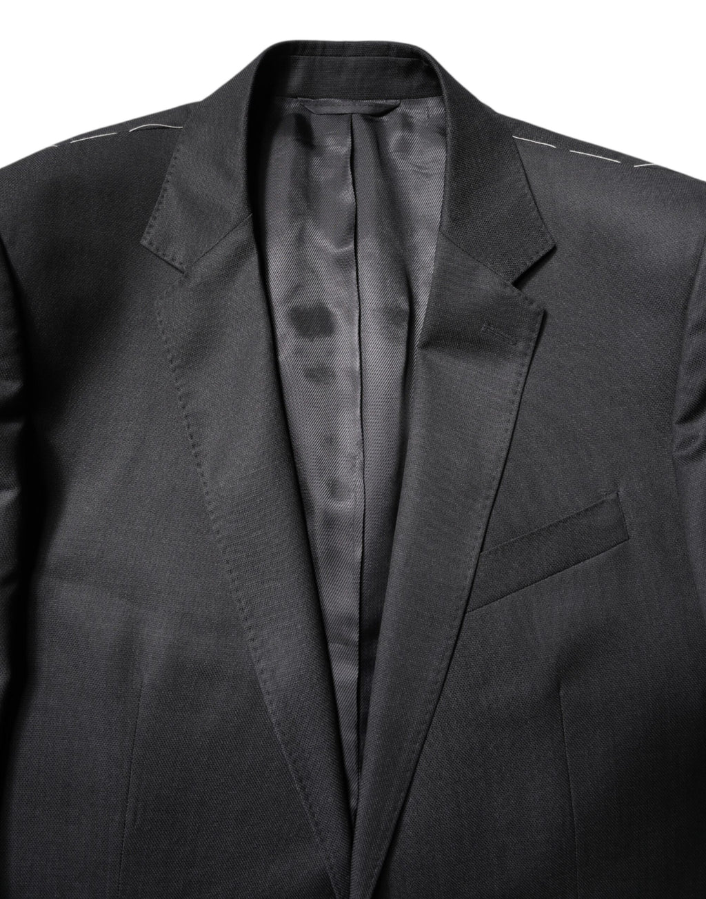 Costume homme en laine gris foncé Dolce & Gabbana à deux pièces, veste croisée simple boutonnage, élégant et sophistiqué.