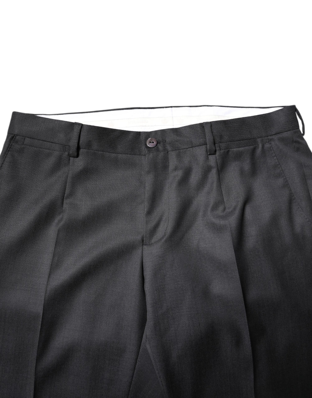 Costume homme Dolce & Gabbana en laine gris foncé, deux pièces, avec veste à simple boutonnage et pantalon assorti.